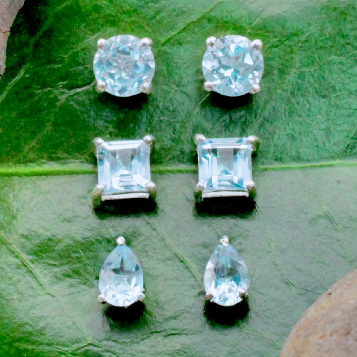 Blue Topaz Stud Earrings - Faceted - Sterling Silver